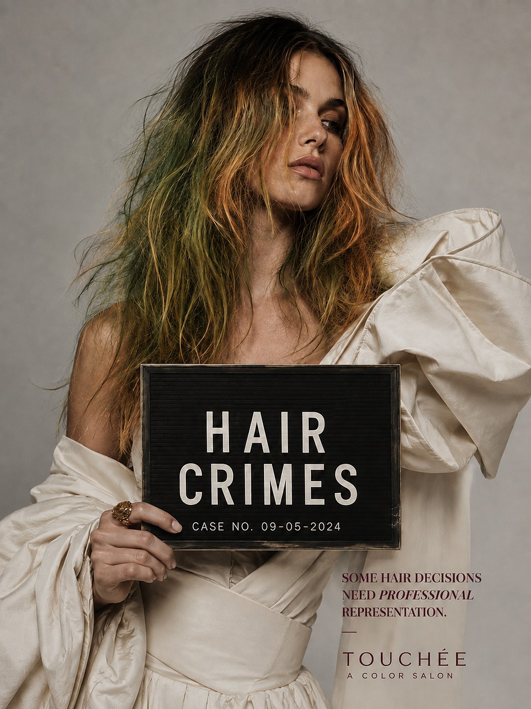 Hair Crimes campaign poster — banded green and orange hair