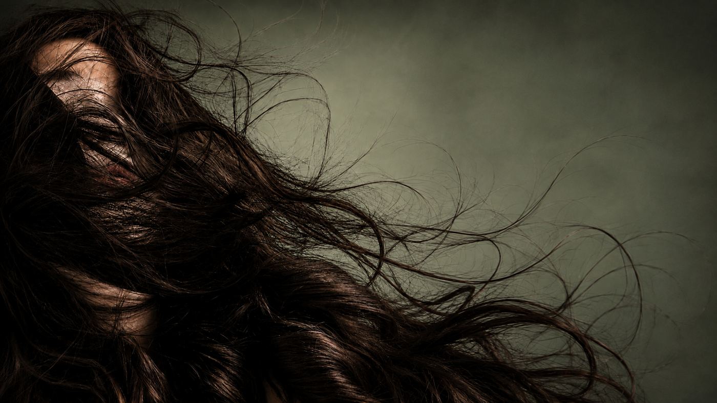 Soft lived-in brunette with warm highlights