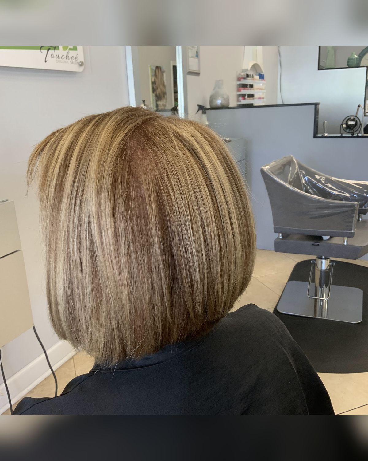 Dimensional blonde bob with a clean perimeter line, Juno Beach FL