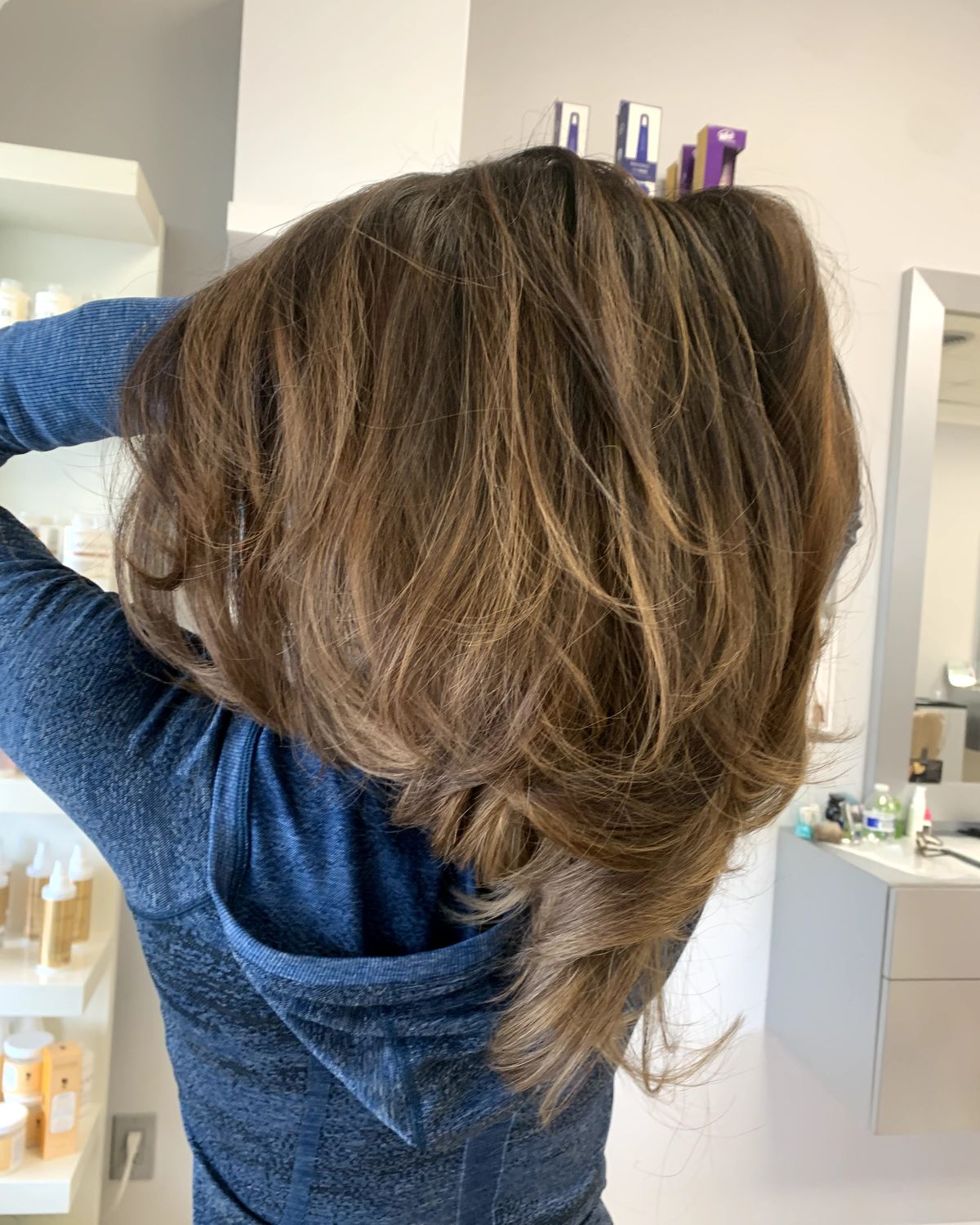 Grown-out bronde layers with movement cut into the interior — Toucheé Organic Salon, Juno Beach