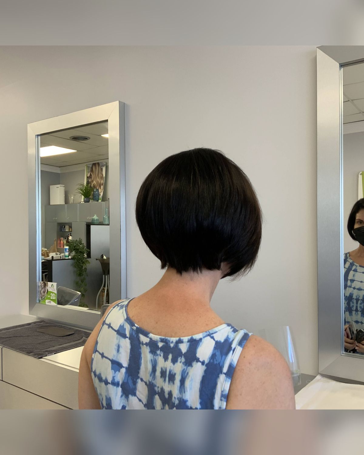 Precision dark bob cut at Touchée Organic Salon, Juno Beach Florida