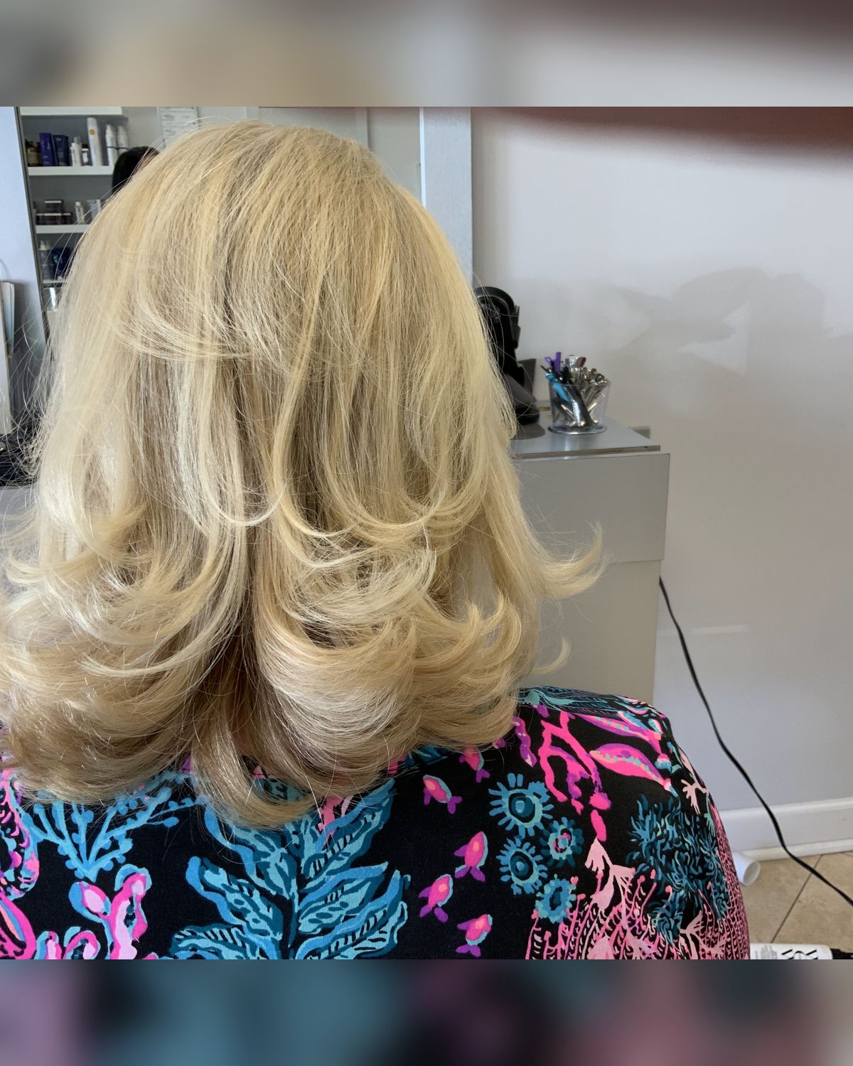 Soft blonde bob with movement through the interior, Juno Beach salon